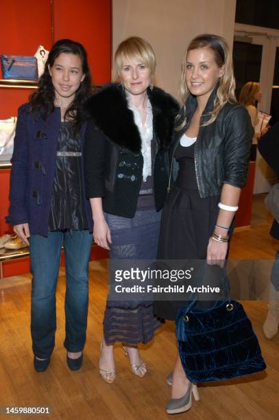 Cecilia Becker, Amy Astley and Victoria Traina attend Teen Vogue and Traina's holiday shopping event at Hogan Spring Street.