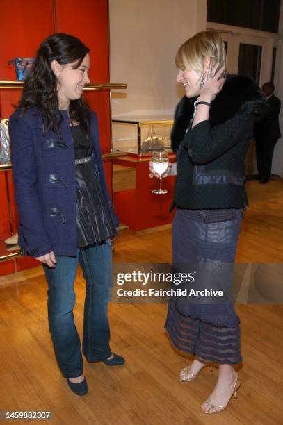 Cecilia Becker and Amy Astley attend Teen Vogue and Victoria Traina's holiday shopping event at Hogan Spring Street.