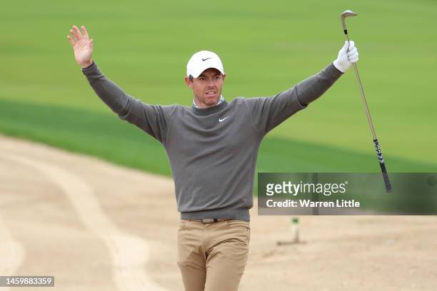 Rory McIlroy of Northern Ireland reacts following their second shot for an eagle on the 8th hole during Day Two the Hero Dubai Desert Classic at...