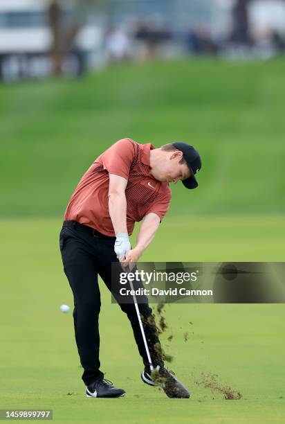 Robert MacIntyre of Scotland plays his second shot on the ninth hole during the completion of his first round on Day Two the Hero Dubai Desert...