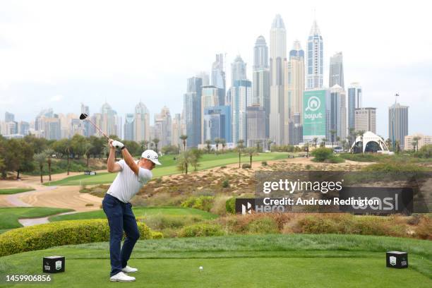 Chase Hanna of the USA tees off on the 8th hole during Day Two of the Hero Dubai Desert Classic at Emirates Golf Club on January 27, 2023 in Dubai,...