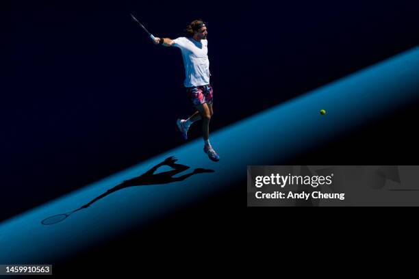 Stefanos Tsitsipas of Greece plays a backhand in the Semifinal singles match against Karen Khachanov during day 12 of the 2023 Australian Open at...