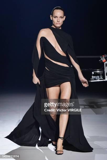 Amber Valletta walks the runway during the Mugler Ready to Wear Fall/Winter 2023-2024 fashion show as part of Paris Fashion Week on January 26, 2023...