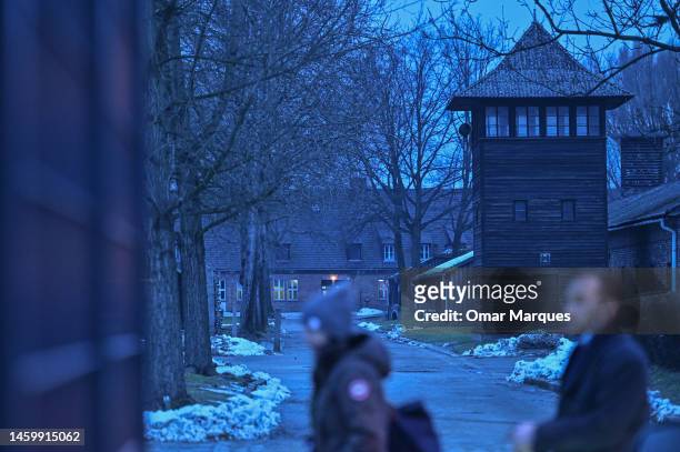 Workers arrive for the Holocaust Remembrance Day at the former Auschwitz I site on January 27, 2023 in Oswiecim, Poland. International Holocaust...