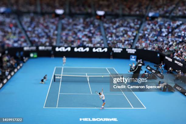 Novak Djokovic of Serbia serves in the Semifinal singles match against Tommy Paul of the United States during day 12 of the 2023 Australian Open at...