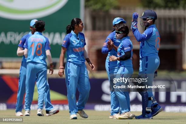 Hrishita Basu of India celebrates with teammates after taking the wicket of Emma Irwin of New Zealand during the ICC Women's U19 T20 World Cup 2023...