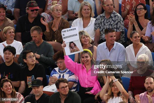 Spectator holds a sign in the Semifinal singles match between Novak Djokovic of Serbia and Tommy Paul of the United States during day 12 of the 2023...