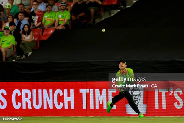 Chris Green of the Thunder catches out Marnus Labuschagne of the Heat during the Men's Big Bash League match between the Sydney Thunder and the...