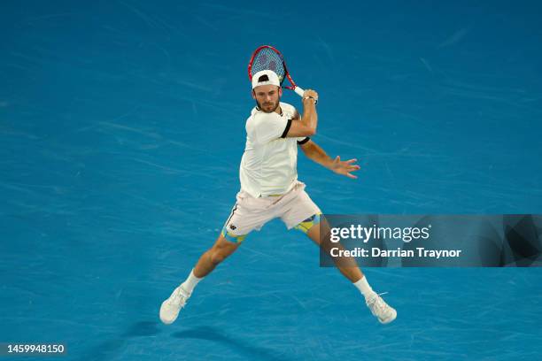 Tommy Paul of the United States plays a forehand in the Semifinal singles match against Novak Djokovic of Serbia during day 12 of the 2023 Australian...