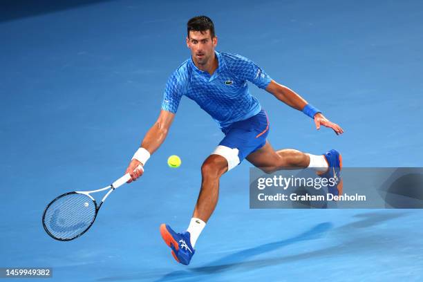 Novak Djokovic of Serbia plays a forehand in the Semifinal singles match against Tommy Paul of the United States during day 12 of the 2023 Australian...