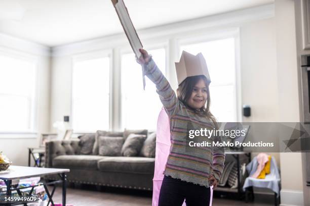 young girl playing in homemade medieval knight costume - albert krieger stock-fotos und bilder