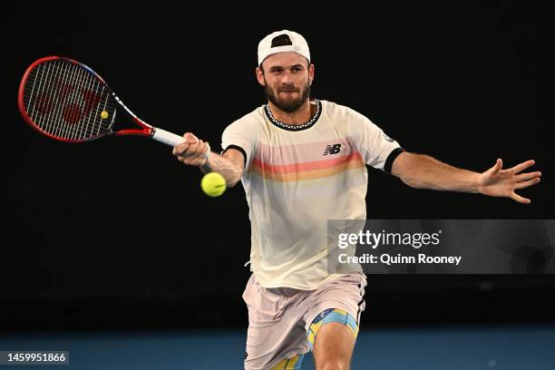 Tommy Paul of the United States plays a forehand in the Semifinal singles match against Novak Djokovic of Serbia during day 12 of the 2023 Australian...