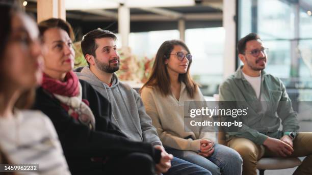 group of business people listening to business speech - speaker series stock pictures, royalty-free photos & images