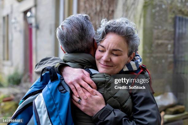 reuniting with a friend - reconciliation stock pictures, royalty-free photos & images