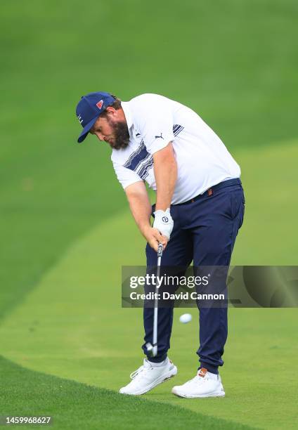 Andrew Johnston of England plays his second shot on the first hole during the completion of his first round on Day Two the Hero Dubai Desert Classic...