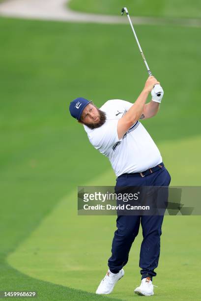 Andrew Johnston of England plays his second shot on the first hole during the completion of his first round on Day Two the Hero Dubai Desert Classic...