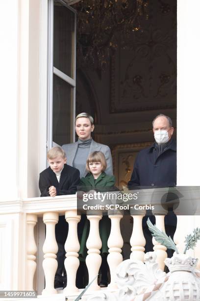 Princess Charlene of Monaco, Prince Jacques of Monaco, Princess Gabriella of Monaco and Prince Albert II of Monaco appear at the Palace balcony...