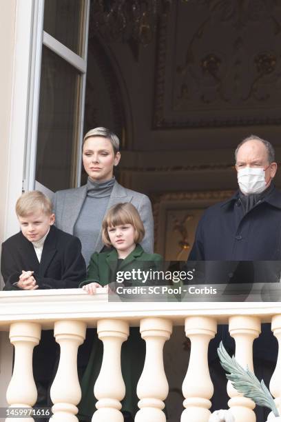 Princess Charlene of Monaco, Prince Jacques of Monaco, Princess Gabriella of Monaco and Prince Albert II of Monaco appear at the Palace balcony...