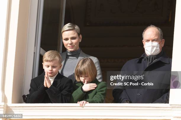 Princess Charlene of Monaco, Prince Jacques of Monaco, Princess Gabriella of Monaco and Prince Albert II of Monaco appear at the Palace balcony...