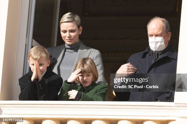 Princess Charlene of Monaco, Prince Jacques of Monaco, Princess Gabriella of Monaco and Prince Albert II of Monaco appear at the Palace balcony...