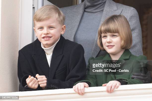 Prince Jacques of Monaco and Princess Gabriella of Monaco appear at the Palace balcony during the Sainte Devote Celebration on January 27, 2023 in...