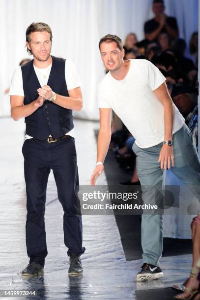 Fashion designers David Neville and Marcus Wainwright on the runway after Rag & Bone's spring 2014 show in Skylight at Moynihan Station.