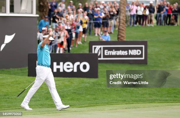 Ian Poulter of England celebrates chipping in on the 9th green during Day Two of the Hero Dubai Desert Classic at Emirates Golf Club on January 27,...