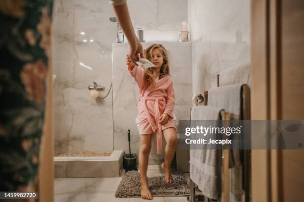 small girl in bathroom - kid girl towel stock pictures, royalty-free photos & images