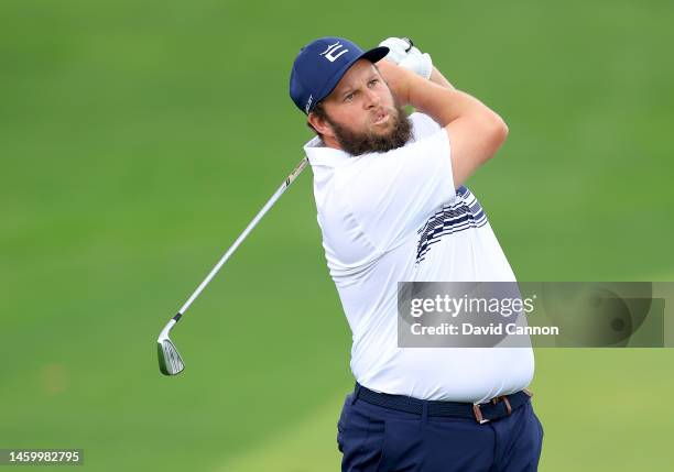 Andrew Johnston of England plays his second shot on the first hole during the completion of his first round on Day Two the Hero Dubai Desert Classic...