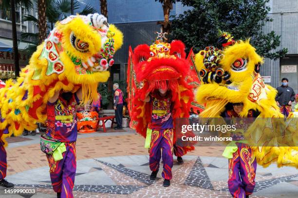 chinese new year in hong kong - lion dance stock pictures, royalty-free photos & images
