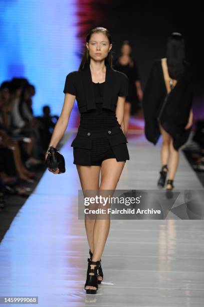 Model on the runway at Paolo Errico's spring 2010 show, part of the Incubatore Della Moda, at the Milano Moda Donna Sala Spiga.