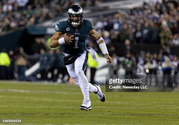 Philadelphia Eagles quarterback Jalen Hurts runs upfield during the NFC divisional playoff game between the New York Giants and Philadelphia Eagles...