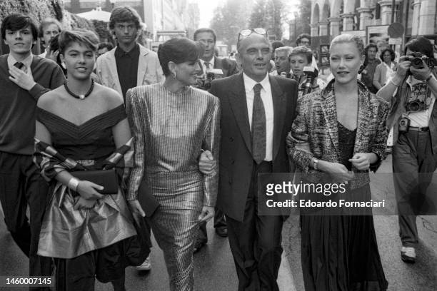 View of, fore from second left, Italian actress Claudia Cardinale, film director Pasquale Squitieri , and actress Nancy Brilli as they lead a parade...