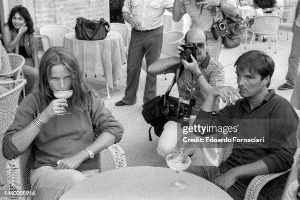 French actors Dominique Sanda and Jacques Zabor as they sit together at a table on the terrace of the Excelsior hotel during the Venice Film...