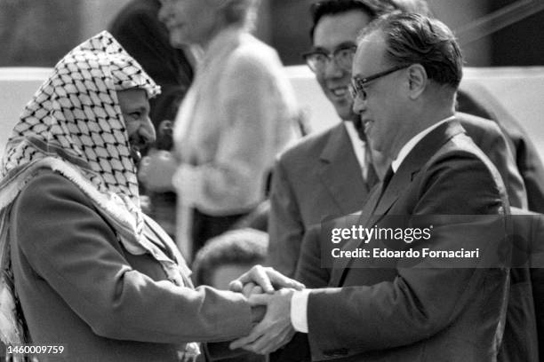 During Italian politician Enrico Berlinguer' funeral, Palestine Liberation Organization leader Yasser Arafat and Chinese Prime Minister Zhao Ziyang...