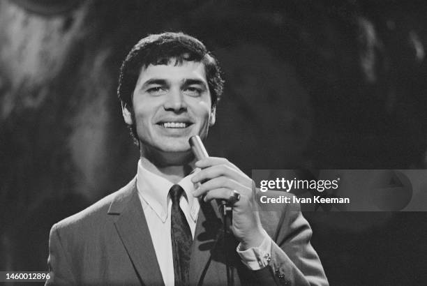 English pop singer Engelbert Humperdinck performs on the set of a pop music television show in London in 1967.