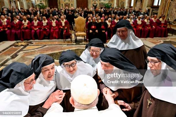 Pope Francis greets nuns during an audience at the Clementina Hall with the members of the Apostolic Tribunal of the Roman Rota on January 27, 2023...