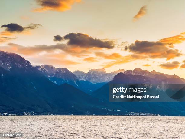 beautiful sunset at the foot of swiss alps, montreux - montreux stock pictures, royalty-free photos & images