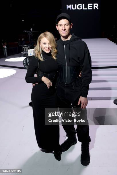 Kylie Minogue and Designer Casey Cawallader pose backstage during the Mugler Fall Winter 2022/23 Haute Couture show at La Grande Halle de La Villette...
