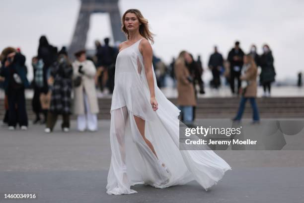 Chloe Lecareux seen wearing a white transparent dress before the Georges Hobeika show on January 23, 2023 in Paris, France.