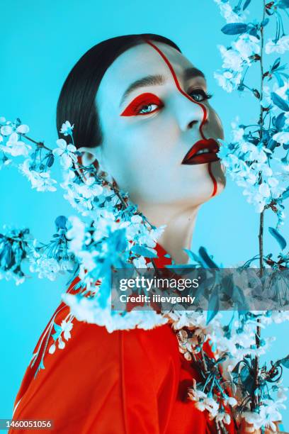 fashion makeup. woman in kimono. blooming cherry - japanese flower arrangement stock pictures, royalty-free photos & images