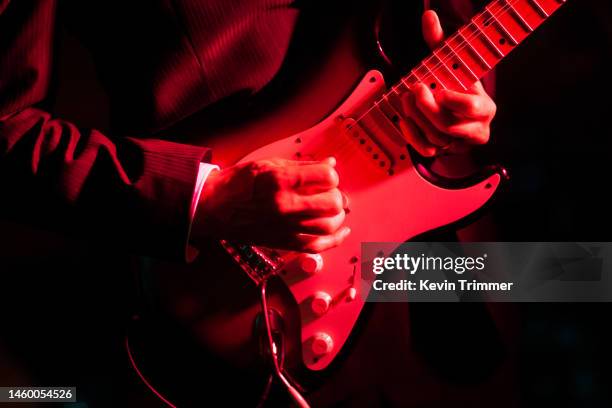 guitar solo bending the note - musical instrument string stock pictures, royalty-free photos & images