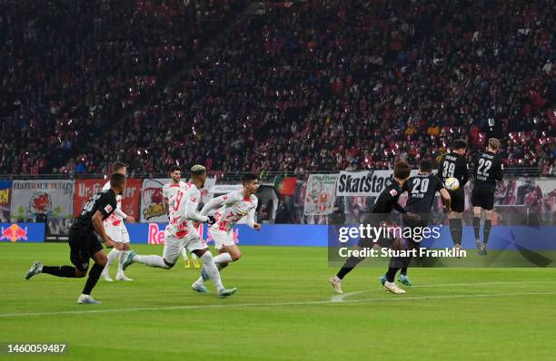 Dominik Szoboszlai of RB Leipzig scores the team's first goal from a free kick during the Bundesliga match between RB Leipzig and VfB Stuttgart at...