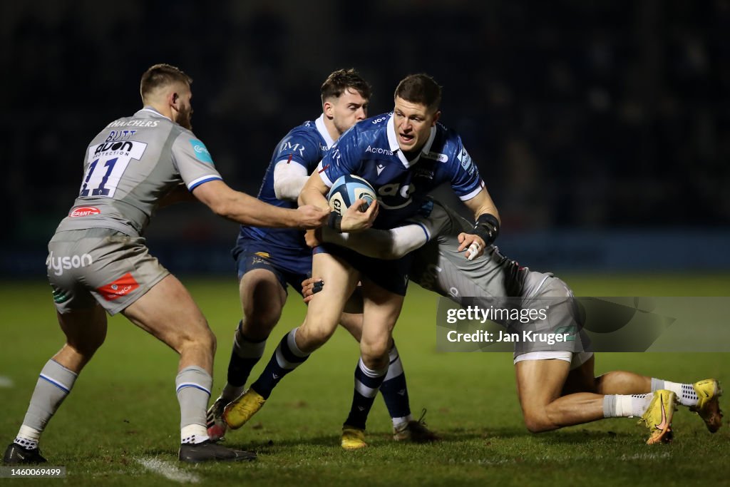 James Gaiger Rugby Sam James of Sale Sharks is tackled by Matt Gallagher of Bath Rugby ...