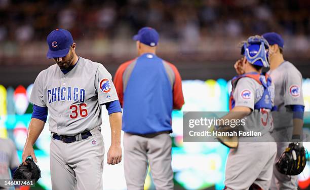 Randy Wells of the Chicago Cubs leaves the game against the Minnesota Twins during the sixth inning on June 8, 2012 at Target Field in Minneapolis,...