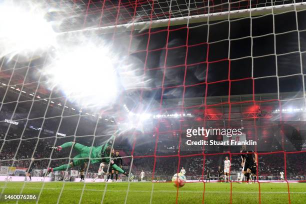 General view as Dominik Szoboszlai of RB Leipzig scores the team's second goal as Florian Mueller of VfB Stuttgart attempts to make a save during the...