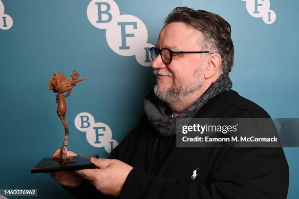 Guillermo del Toro poses with 'Pinocchio' puppet ahead of the 'Guillermo del Toro in Conversation: Animation for All' at BFI Southbank on January 27,...