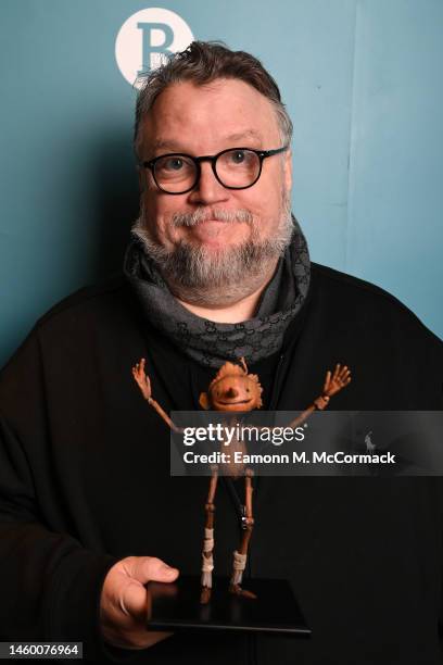 Guillermo del Toro poses with 'Pinocchio' puppet ahead of the 'Guillermo del Toro in Conversation: Animation for All' at BFI Southbank on January 27,...