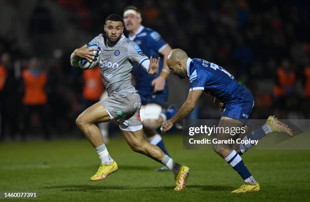 Jonathan Joseph of Bath hands off Tom O'Flaherty of Sale during the Gallagher Premiership Rugby match between Sale Sharks and Bath Rugby at AJ Bell...