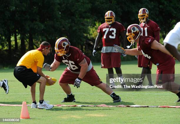 Redskins defense Chris Neild and Adam Cariker during second day of Redskins Training Camp on July 30, 2011.